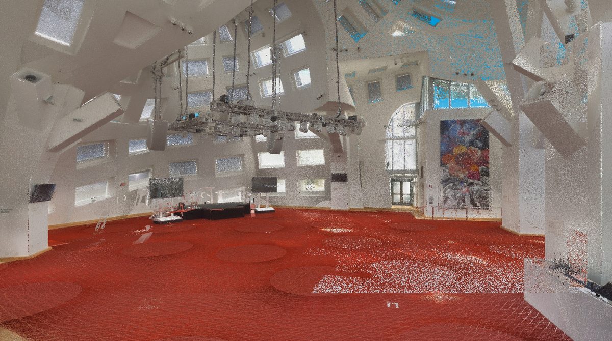Registered point cloud of a curved-walled event space — angled roof panels, irregular window openings, a hung lighting truss and a red carpeted floor.
